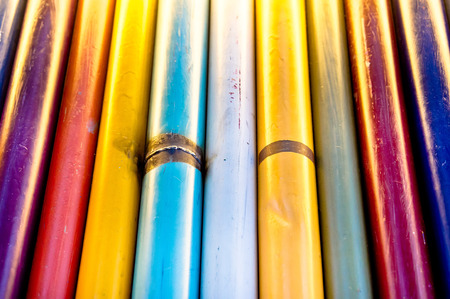 Colorful metal poles as a background imageの写真素材