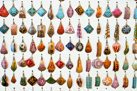 Selection of traditional turkish earrings on display in a storeの写真素材