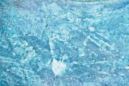 An etched metal surface, as a background imageの写真素材