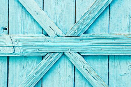 Part of a blue painted wooden doorの写真素材