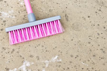 Part of a pink plastic toy broomの写真素材