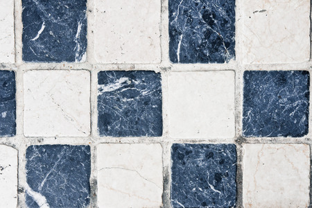 Black and white square tiles as a backgroundの写真素材