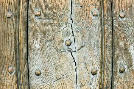 Weathered wooden panels with nails, as a backgroundの写真素材