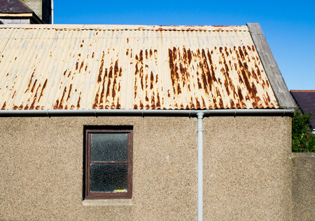 A rusty corrugated metal roof on an out buidling in Scotland