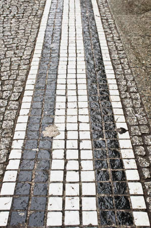 White and grey street tiles as a backfground imageの写真素材