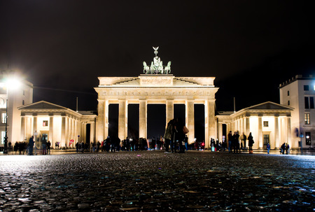 BERLIN, GERMANY - NOVEMBER 22 2015:  People gathered around the Brandenburg Gate at night.のeditorial素材