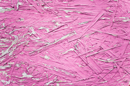 Close up of part of a pink painted plywood surface, as a  backgroundの写真素材