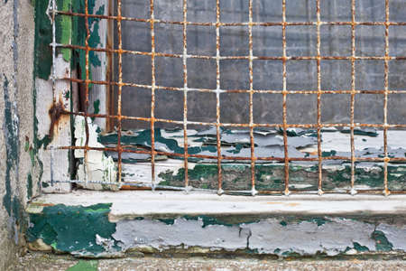 Part of a weasthered wooden window frame with