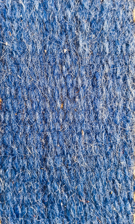Part of a blue wool or kilim textile as a backgroundの写真素材