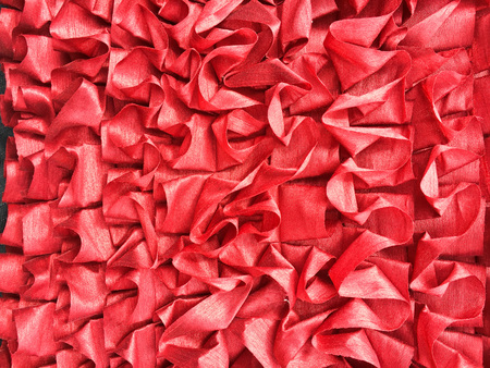 A red textile as a backgroundの写真素材