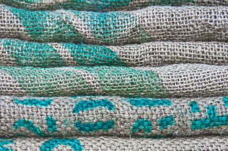 Folded hessian sheets as a backgroundの写真素材