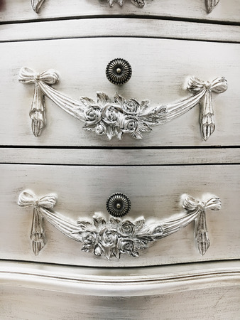 Close up of a vintage chest of drawersの写真素材