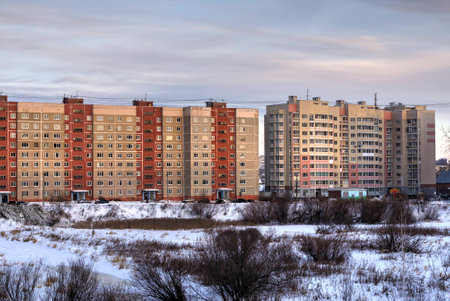 Residential high-rise buildings on a winter morning in the town of Yekaterinburgの写真素材