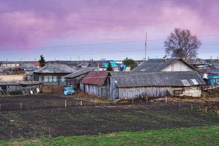 Evening landscape of a Russian village in the Uralsの写真素材