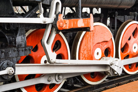 Vintage railway wheels in the style of steampunk closeup