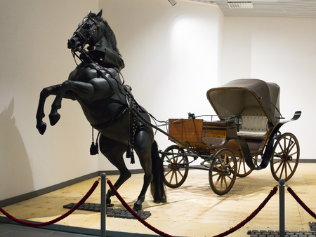 Verkhnyaya Pyshma, Russia - October 20, 2018: Exhibit carriage with a horse in the museum of retro cars in the city of Verkhnyaya Pyshma in Russiaのeditorial素材