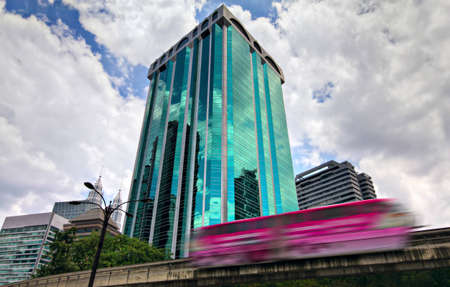 Monorail in Kuala Lumpur near plate-glass buildingのeditorial素材