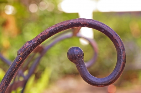 curve metal shape in the green gardenの写真素材