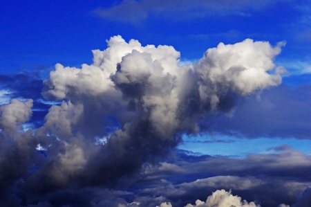big dense cloud under the blue skyの写真素材