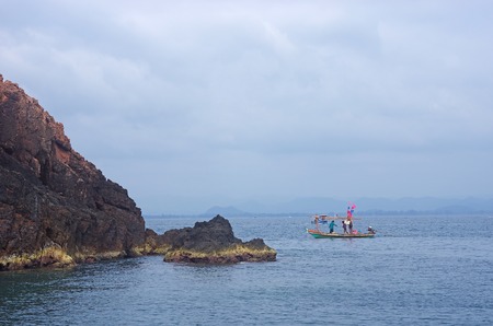 sea scene with the local boatの写真素材