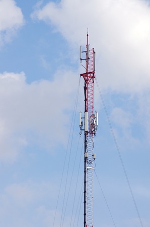 mobile phone pole under the blue skyの写真素材