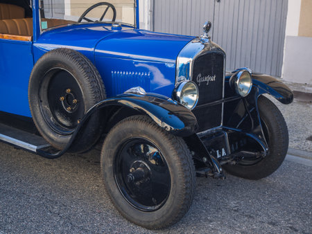 Loriol sur Drome, France - 17 September, 2022: Vintage Blue Peugeot 190 S convertible with folding...