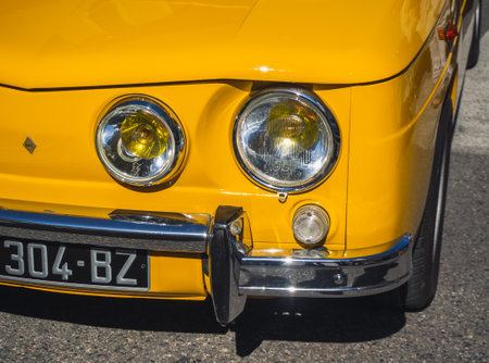 Loriol sur Drome, France - 17 September, 2022: Vintage yellow Renault 8 S (1968-1971) on the street....