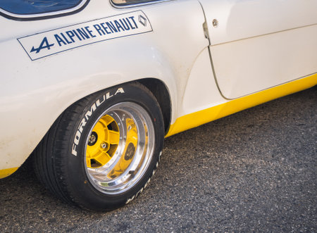 Loriol sur Drome, France - 17 September, 2022: Vintage renault alpine berlinette 1300. Old white and yellow racing car parked on the street. Classic car exhibition in Loriol sur Drのeditorial素材