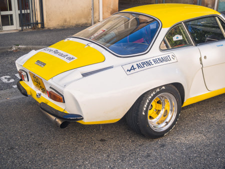 Loriol sur Drome, France - 17 September, 2022: Vintage renault alpine berlinette 1300. Old white and yellow racing car parked on the street. Classic car exhibition in Loriol sur Drのeditorial素材