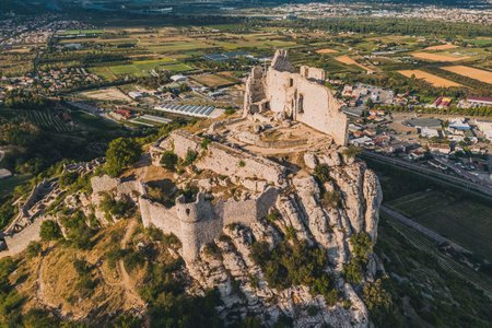 ChÃ¢teau de Crussol - is a mostly-ruined 12th century limestone castle in the commune of Saint-PÃ©ray that dominates the valley of RhÃ´ne, just opposite Valence in the ArdÃ¨che dÃ©parteの写真素材