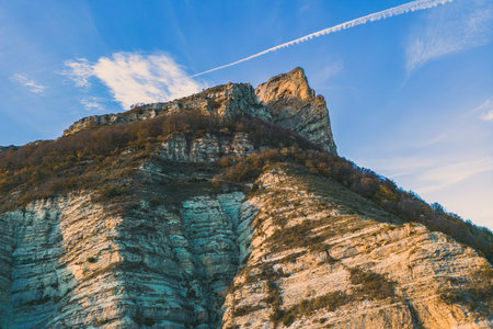 Autumn landscape in Les Trois Becs in DrÃ´me provenÃ§ale. The top limestone rocks is covered with autumn colorsの写真素材