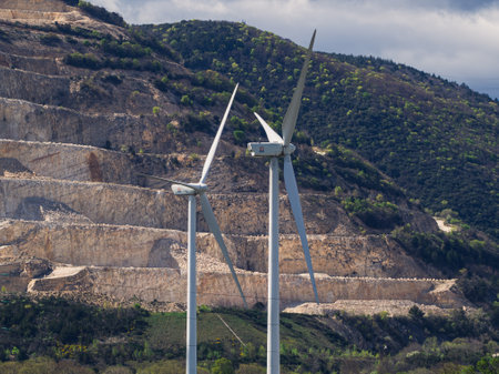 Cruas, France - 4 April 2023: A wind farm next to the nuclear power plant in Cruas, France