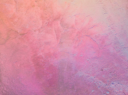A close-up of a cracked pink salt lake at sunset creating abstract patterns. Salt production plants evaporated a brine pond in a salt lake. Salin de Giraud saltworks in Camargue, Pの写真素材