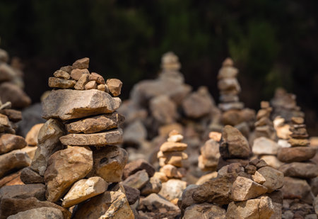 A close-up of the small pyramids made of stones in the park. Abstract Rustler canyon moher cliffs landscape. Provencal Colorado near Roussillon, Southern France.の写真素材