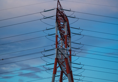 High voltage post. High-voltage tower sky background. Electricity distribution station.