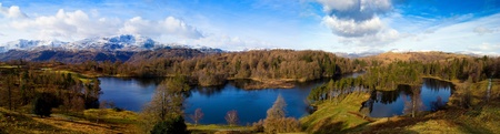 view over tarn haws with mountains in the backgroundの写真素材
