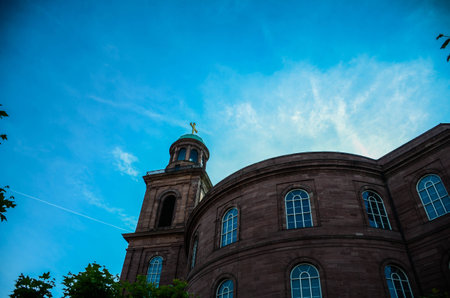 Separated cloud above the buildingの写真素材