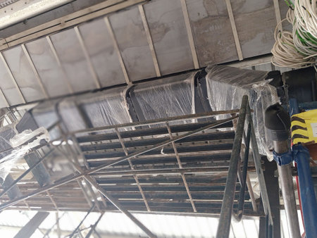 Ceiling of a building in the city. Installation of a roof.の写真素材