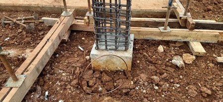 construction site of new residential house with concrete pillar and steel meshの写真素材