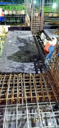 Workers on the construction site of a new multi-storey buildingの写真素材