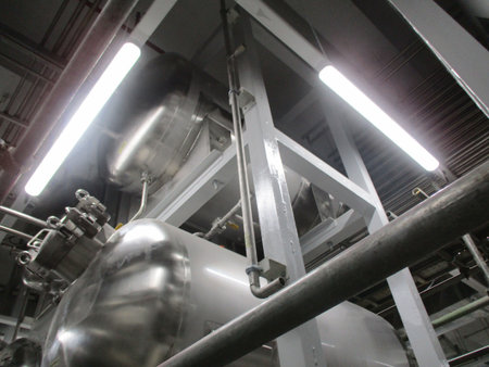Equipment, cables and piping as found inside a modern industrial power plant