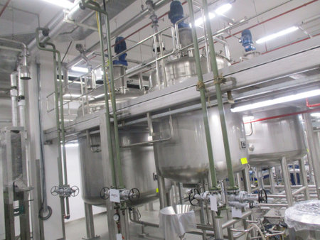The stainless steel tanks and machinery in a brewery,, tangshan, china.