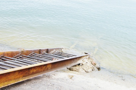Metal staircase leads to the sea on the pierの写真素材