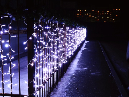 Decoration for the new year in the winter on the fence in the cityの写真素材