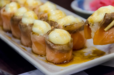 Sushi roll and burn make it more deliciousの写真素材