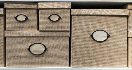 Beige wicker boxes with lids and place for signature. Boxes for moving or storing various little things.の写真素材