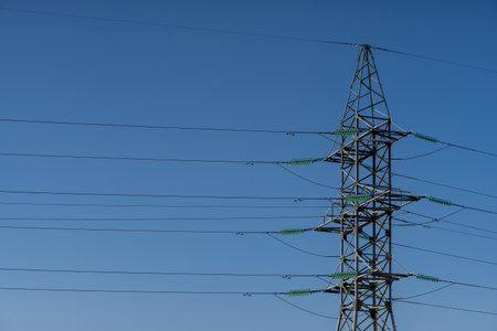 Old rusty High voltage power switchgear station, high voltage power line, line and insulated at blue...