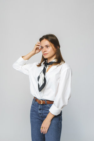young woman isolated on gray background