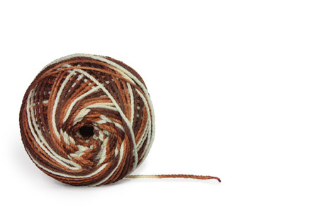 Polyester yarn balls in mixed colors white, brown. Can be used for crochet. Isolated on a white backgroundの写真素材