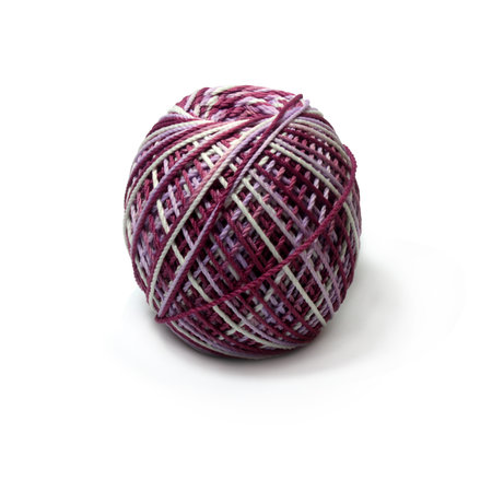 Polyester yarn balls in mixed colors white and purple. Can be used for crochet. Isolated on a white backgroundの写真素材